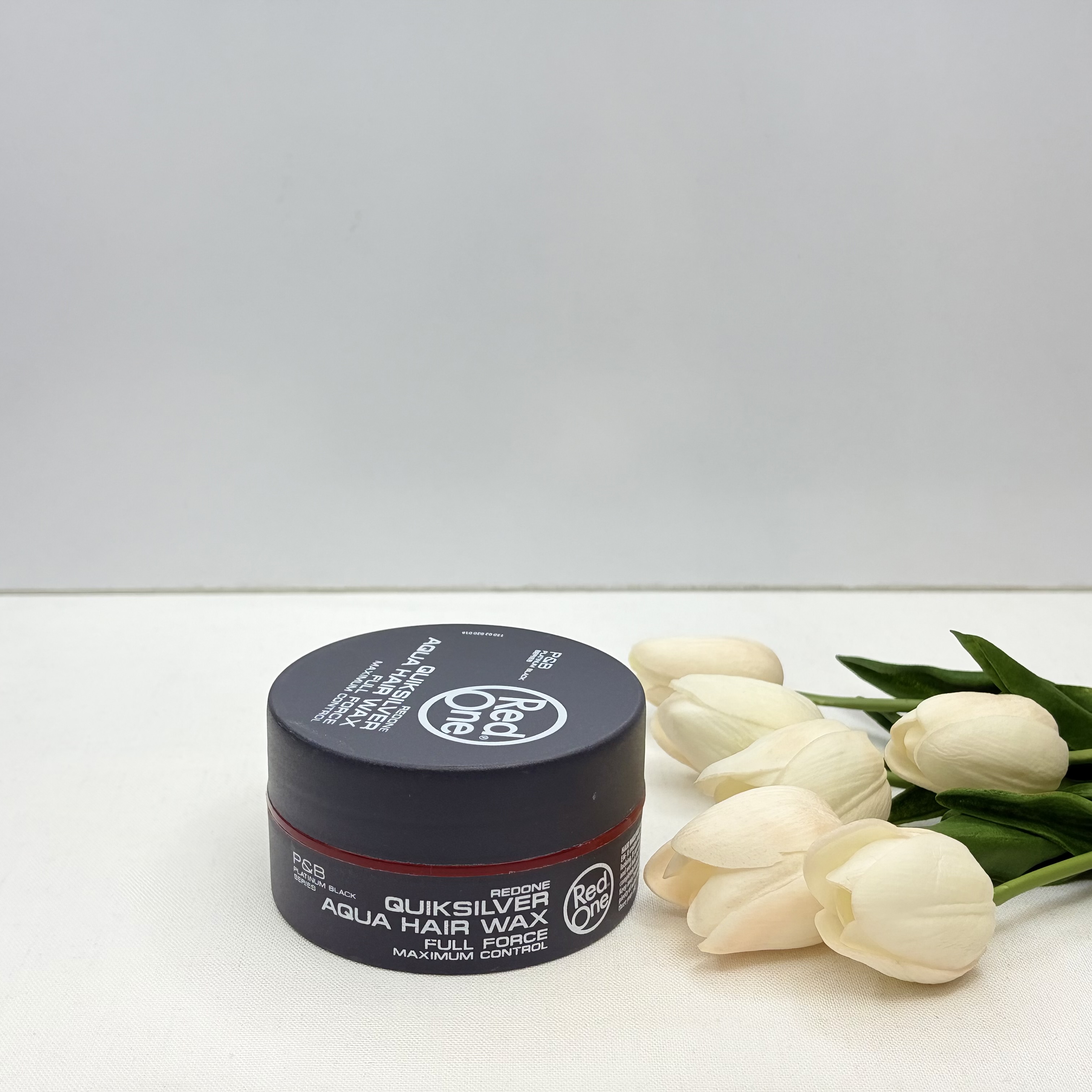 ژل واکس موی رنگ مشکی QUIKSILVERنگه دارندگی قوی  براقیت متوسط فینیش طبیعی و کمی مات تر از رنگ قرمز و آبی