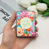 آینه جیبی دوطرفه طرح گلدار فلزی وچرمیمستطیل7.5cm در 6.5cm