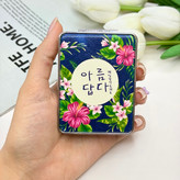 آینه جیبی دوطرفه طرح گلدار فلزی وچرمیمستطیل7.5cm در 6.5cm