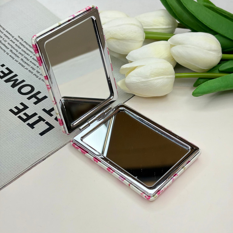 آینه جیبی دوطرفه طرح گلدار ریز چرمی مستطیل8.5cm در 6cm
