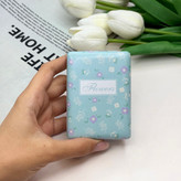 آینه جیبی دوطرفه طرح گلدار ریز مستطیلی چرم 8.5cm در 6cm
