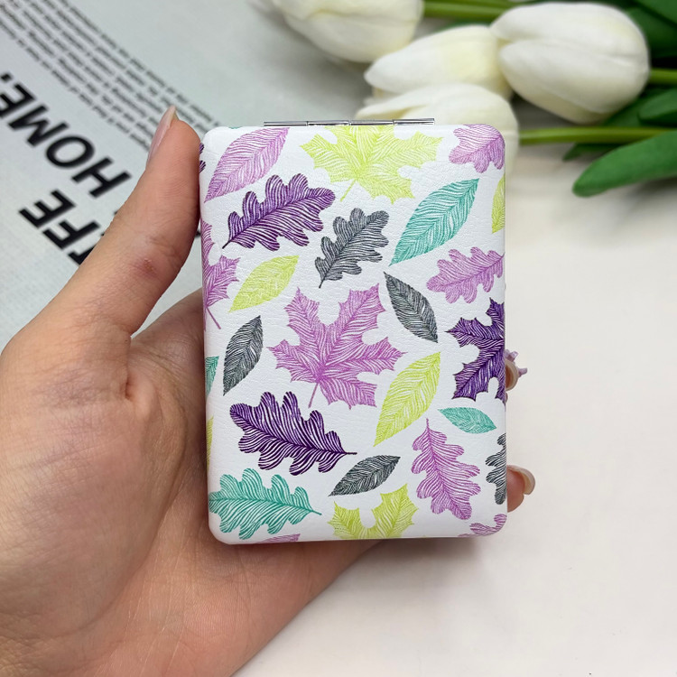 آینه جیبی دوطرفه طرح برگ مستطیلی چرم 8.5cm در 6cm