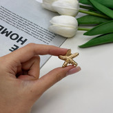کلیپس فلزی طرح ستاره دریایی رنگ طلایی براق سایز کوچک2cm