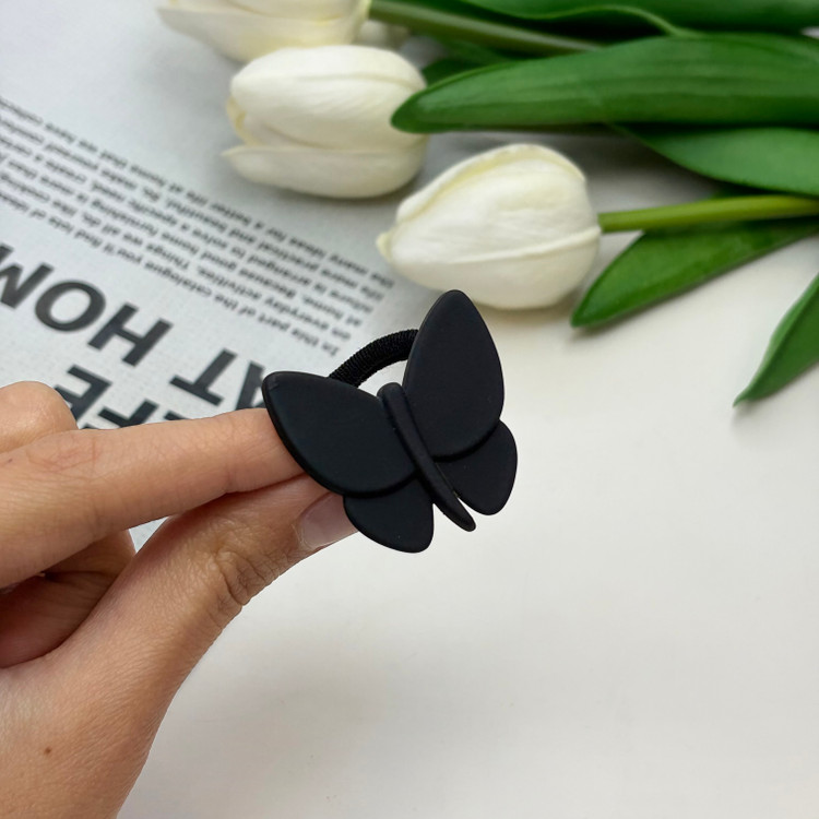 کش مو جفتی پیکسل دار حوله ای طرح پروانه رنگ مشکی