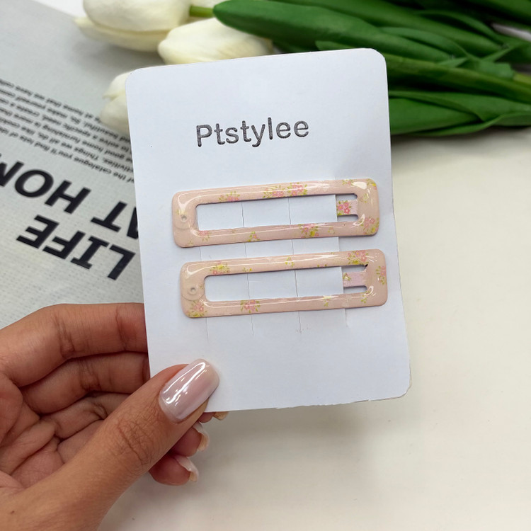 گیره مو براق جفتی تق تقی طرح گلدار وپینترستی رنگ نارنجی6cm