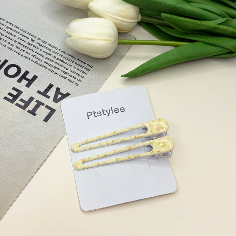 گیره مو جفتی براق انبری طرح گلدار وپینترستی براق رنگ زرد6cm