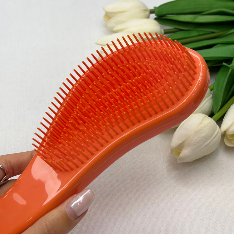 برس مو گره بازکن مدل منحنی مناسب موهای فر و صاف رنگ نارنجی