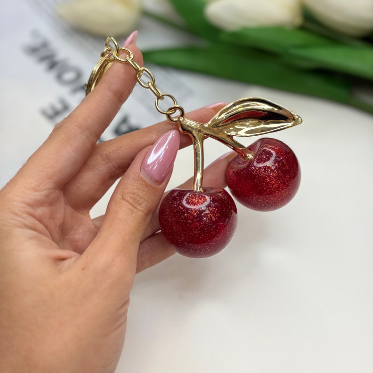 چارم بگ آویز کیف طرح گیلاس آلبالو شاین دار طرح برند کوچ Coach
